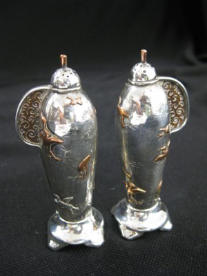 Set of rare Tiffany sterling silver and mixed metals salt and pepper shakers ($4,000).