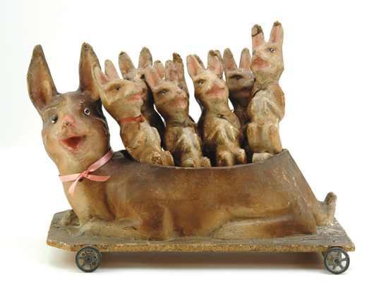Circa-1870s rabbit skittles set, 18 inches long, mother rabbit body houses eight figures. Estimate $4,000-$6,000. Image courtesy Bertoia Auctions.