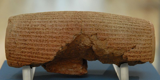 View of back of The Cyrus Cylinder, terracotta, Babylonia (southern Iraq), circa 539-530 B.C. Courtesy Wikimedia Commons.