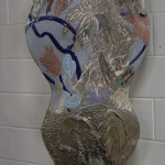 Steven and Susan Kemenyffy of Pennsylvania created this large vase using the Raku-style pottery tradition of hand molding and low firing temperatures. The 52-inch-high vase comes with a custom-made faux marble base. It is estimated at $2,000-$3,000. Image courtesy of Midwest Auction Galleries Inc.
