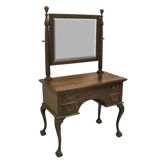 This carved mahogany dressing table is attributed to Herter Brothers. The estimate is $700-$1,000. Image courtesy of William J. Jenack Estate Appraisers & Auctioneers.