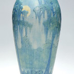 Newcomb artist Anna Frances Simpson painted a full moon shining through a bough of a cypress tree on this 13 7/8-inch-tall vase. Dated in code for 1918, the vase has an $8,000-$10,000 estimate. Image courtesy Cincinnati Art Galleries.