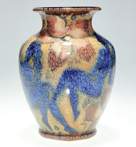 Thee languid blue nudes are interspersed around this Rookwood vase by Jens Jensen, which is dated 1933. The 6 5/8-inch vase has a $7,500-$9,500 estimate. Image courtesy Cincinnati Art Galleries.