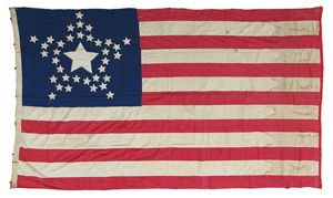 1865 Civil-War-era, hand-stitched American Flag, Great Star pattern, accompanied by photo and marriage certificate of the seamstress, Sara Elizabeth Young Lee. Estimate $4,500-$7,500. Image courtesy Mosby & Co. Auctions.