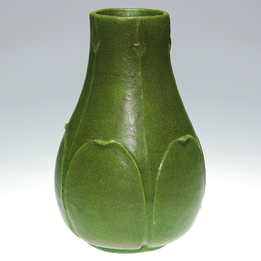 A Grueby 7 inch “bottle” vase in matte green with leaves modeled by Florence Liley brought $1900 in June 2009. Courtesy Cincinnati Art Galleries