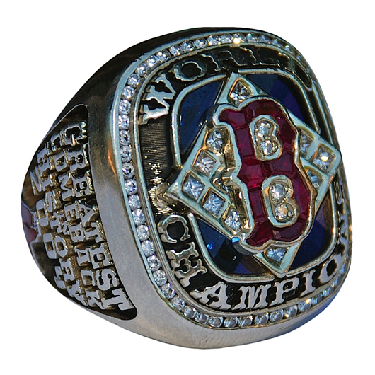 2004 Boston Red Sox World Championship ring adorned with diamonds and rubies, as well as enameled “red socks” and other symbols of Boston and its hometown team. Retains original box. Reserve: $10,000. Image courtesy Grey Flannel Auctions.