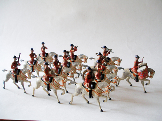 The auction catalog’s cover lot, a first-version, circa-1900 Britains Life Guard Band, slotted-arms. Estimate $600-$700. From the Vincent C. Banker Collection.The auction catalog’s cover lot, a first-version, circa-1900 Britains Life Guard Band, slotted-arms. Estimate $600-$700. From the Vincent C. Banker Collection.