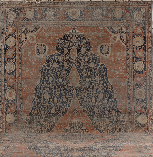 Once the property of Harvard University, this late-19th-century Motasham Kashan carpet is from central Persia. It measures 26 feet 6 inches x 13 feet 9 inches. It has a $25,000-30,000 estimate. Image courtesy Skinner Inc.