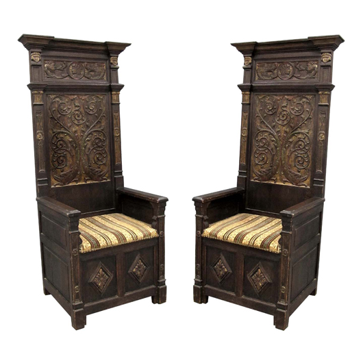 This pair of Renaissance-style carved and painted oak Elders’ chairs dates to the 19th century. The estimate is $1,200-$1,600. Image courtesy William Jenack Auctioneers.
