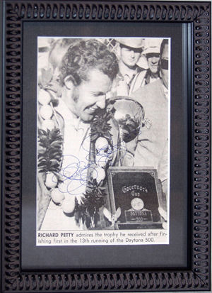 One of the Mansfields’ favorite NASCAR drivers was Richard Petty, pictured in an autographed newspaper clipping after winning the 13th Daytona 500. Image courtesy of DuMouchelles and Live Auctioneers Archive.