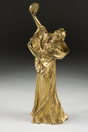 A pair of gilt bronze figural dancers (one shown), by French artist Agathon Léonard brought $60,950.