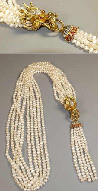 This custom pearl, diamond and ruby necklace in 18K gold and dragon motif is estimated at $4,000-$5,000. Image courtesy of Austin Auction Gallery.