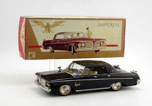1962 tinplate friction Chrysler Imperial with original box, Ashi Toys (Japan), $10,350. Bertoia Auctions image.