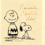 'Peanuts' creator Charles M. Schulz autographed this print of Charlie Brown and Snoopy. Image courtesy of Nate D. Sanders Auction and LiveAuctioneers archive.