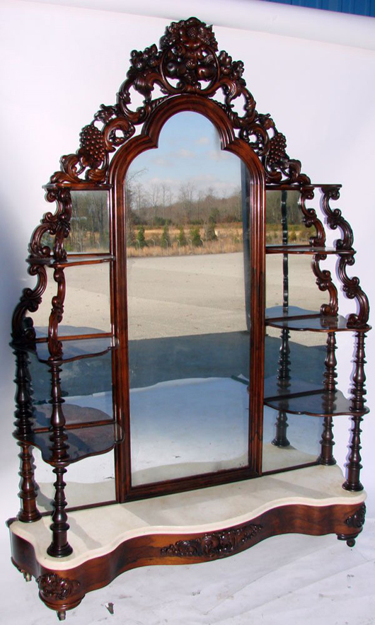 J.H. Belter’s laminated rosewood étagère is from the popular Rosalie pattern. It is 85 inches high, by 48 inches wide. In excellent condition, the étagère has an $18,000-$20,000 estimate. Image courtesy of North Georgia Auction Gallery.