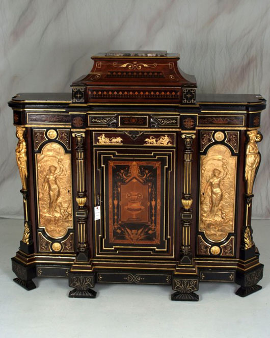 It’s rare to find a large Pottier & Stymus figural Renaissance Revival credenza in such outstanding condition. This one made of rosewood with 18K gold incising and a marble top is 72 1/2 inches wide. It has a $20,000-$30,000 estimate. Image courtesy of North Georgia Auction Gallery.