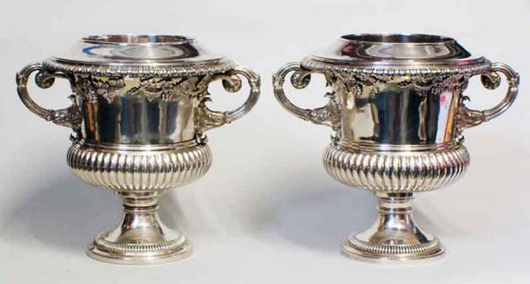 Crafted in Sheffield, England, in 1827, these George IV sterling silver wine coolers are in excellent condition. The have a $20,000-$25,000 estimate. Image courtesy of Auction Gallery of the Palm Beaches Inc.