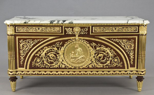 After a model by 18th-century Parisian ébénistes Guillaume Benemen and Joseph Stöckel, this circa 1880 Louis XVI-style ormolu mounted kingwood commode has a $25,000-$35,000 estimate. Image courtesy of Dallas Auction Gallery.