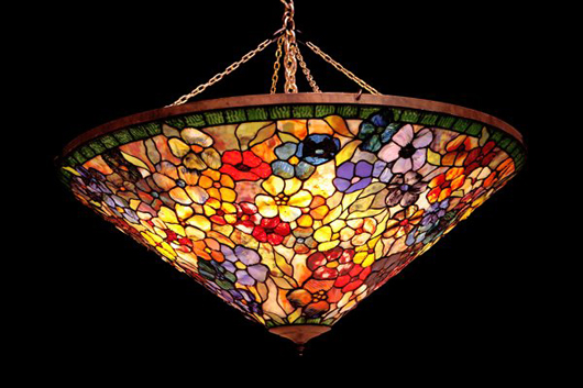 Art Nouveau-style leaded-glass lamp crafted entirely from Tiffany workshop glass, 38-inch diameter, $32,940. Image courtesy LiveAuctioneers.com Archive and Guernsey's.