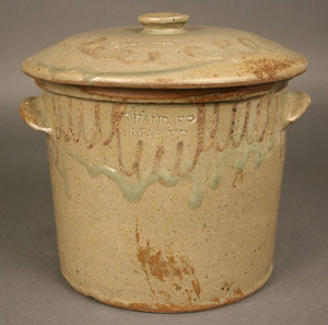 Both the jar and lid of this rare Edgefield, S.C., butter crock are decorated and marked ‘Chandler Maker.’ The estimate on the 9-inch-tall crock is $3,500-$4,500. Image courtesy Case Auctions.