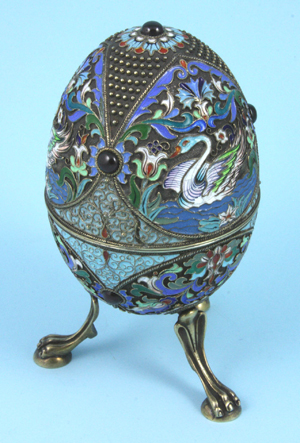 Russian silver enameled egg on claw feet, inlaid garnet stones and silver-and-vermeil wash, est. $4,000-$7,000. Image courtesy of Kaminski’s.