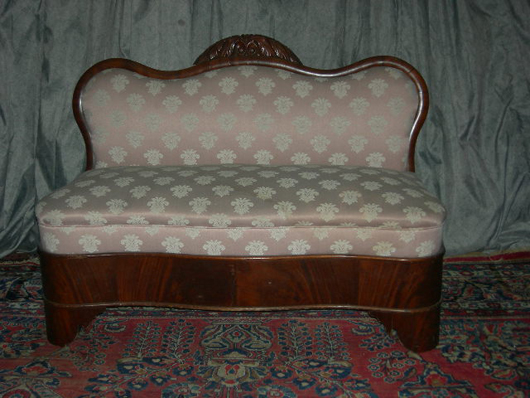Diminutive Empire settee, circa 1840, 43 inches wide and in overall good condition. Image courtesy of Specialists of the South.