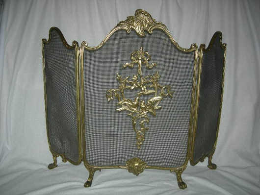 Handsome folding fire screen with ormolu. Image courtesy of Specialists of the South.