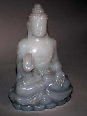An Internet bidder from China claimed this jade figure of a Buddha, which is modeled in a seated position on a double lotus base. The sale price of $4,250 was just shy of the high estimate. Image courtesy of Auction Gallery of the Palm Beaches Inc.