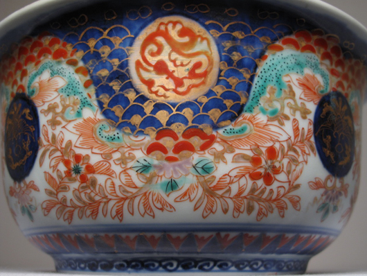 This circa-1780 Imari bowl, 8 inches in diameter, is decorated in underglaze red and blue with gilded highlights. Its central interior panel features two stylized rabbits. Selling price: $825.