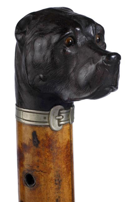 Sword cane with carved dog's head, circa 1880, estimate $1,200-$1,400.  Image courtesy Kimball M. Sterling.