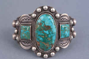 Three large Blue Gem Mine turquoise cabochons highlight this Navajo bracelet crafted circa 1940. It is from the Challis L. Thiessen Collection. Image courtesy of Arch Thiessen