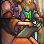 ‘The Lesson’ is a rare early 20th-century stained glass window by Tiffany Studios. In its original bronze frame the window is 48 inches high by 20 inches wide. It has a $50,000-$75,000 estimate. Image courtesy of Great Gatsby’s Antiques and Auctions.
