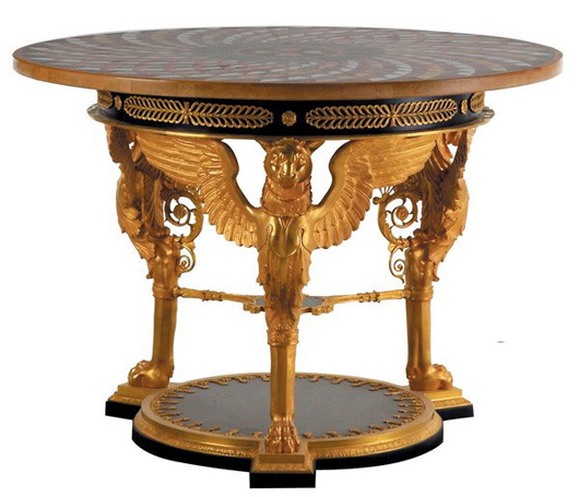 Dore' bronze winged lions support a pietra dura inlaid marble tabletop measuring 60 inches in diameter. The table has a $25,000-$40,000 estimate. Image courtesy of Great Gatsby’s Antiques and Auctions.