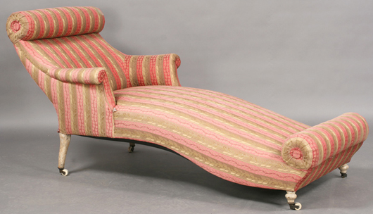 Chaise lounge with roller feet. Image courtesy Kamelot Auctions.