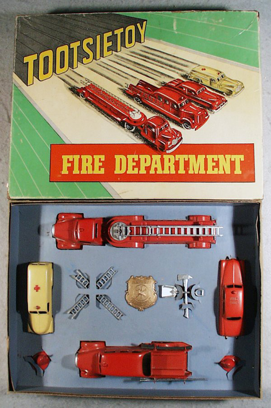Tootsietoy’s 5211 Fire Department set consists of the Mack Ladder Wagon, Pumper, Chevrolet Ambulance and Mercury Fire Chief’s car. Complete with all accessories, original box and inserts, the set has a $500-$800 estimate. Image courtesy of Lloyd Ralston Gallery.