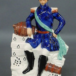 ‘Em. Napoleon’ is marked on the base of this colorful Staffordshire figure, which dates to the mid-1800s. The 16-inch figures has a $300-$500 estimate. Image courtesy of Wiederseim Associates Inc.