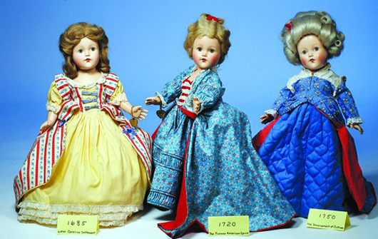 The Effanbee doll in the center is the 1720 The Pioneer American Spirit. All original and in mint condition, it carries a $500-$600 estimate. Image courtesy of Frasher’s Doll Auction.