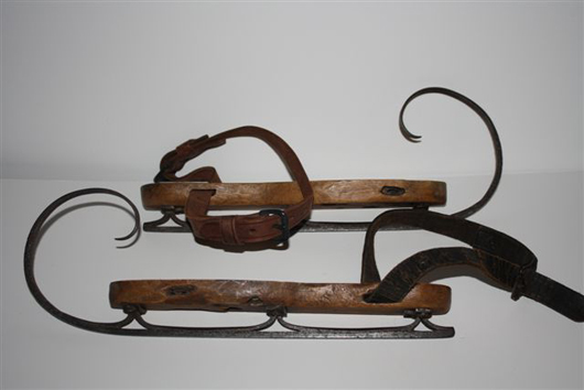 These unmarked skates from the mid-1800s have a wooden footplate. Image courtesy of Karen Cameron, Antique Ice Skate Club.