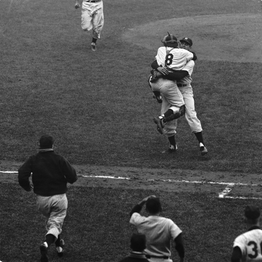 Copyrighted image of New York Yankees catcher Yogi Berra embracing teammate Don Larsen after Larsen pitched a perfect game in the 1956 World Series. From the Diamond Images Collection, licensed through Getty Images. All rights reserved. 