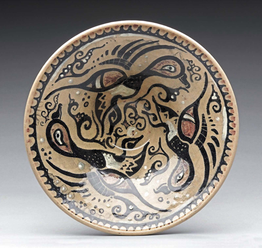 Walter Anderson used many of the same naturalistic themes for pottery decoration that are found in his watercolors. This shallow bowl, thrown by brother Peter Anderson, is decorated with a duck motif. It sold at auction in 2007 for $9,400. Image courtesy Neal Auction Co.