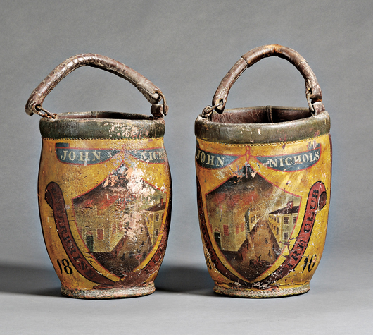It is unusual to find a matched pair of polychrome painted leather fire buckets. This set from Salem, Mass., has a $4,000-$6,000 estimate. Image courtesy Skinner Inc.