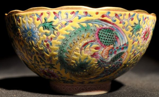 A Qinglong mark is found on this Famille Rose bowl with yellow ground. The bowl is 6 1/2 inches in diameter and 3 inches high. It has a $1,000-$2,000. Image courtesy Wichita Auction Gallery.