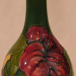 Both sides of this 8 1/2-inch signed Moorcroft pottery have floral decoration. One of several pieces of Moorcroft in the sale, this vase has a $250-$600 estimate. Image courtesy Auction Ten.