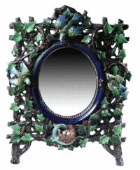 Ivy-covered tree branches with birds and a nest surround this 22-by-16-inch mirror. The majolica frame was made by Hugo Lonitz, who worked in Germany between 1886 and 1904. It brought $3,824 at a Sloans & Kenyon auction in Chevy Chase, Md.