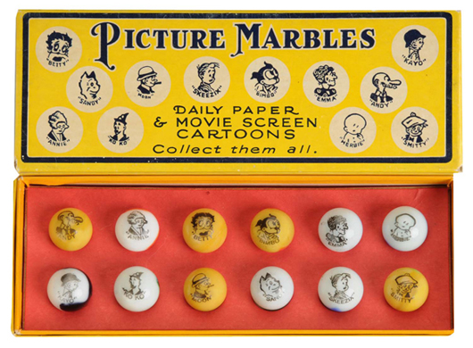 Complete boxed set of 12 Peltier marbles, each with a depiction of an early comic character, $9,200. Image courtesy Dan Morphy Auctions.