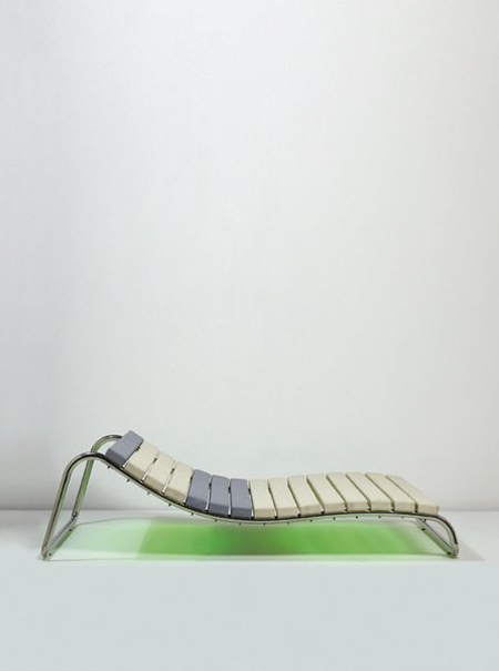 While Johanna Grawunder’s ‘Office Chair for the New Economy’ is from an edition of 12, the color combination of upholstery and lighting makes each one unique. The 2006 sculpture is chrome-plated tubular steel, vinyl and fluorescent tube. It measures 22 inches high by 58 1/2 inches wide by 85 inches long. Image courtesy Phillips de Pury & Co.