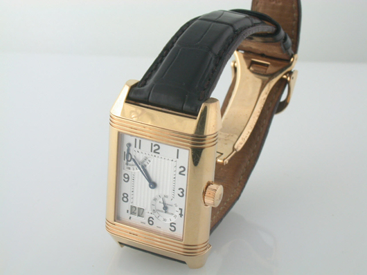 The date appears in the corner of this gold Jaeger LeCoultre Reverso 1000 Hours Control watch (est. $1,500-$2,000). Bunda Jewelry Appraisers and Auctioneers.