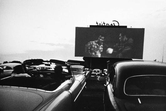 ‘Drive-In Movie,’ Detroit, 1955, gelatin silver print. Detroit Institute of Arts. © Robert Frank, from ‘The Americans.’