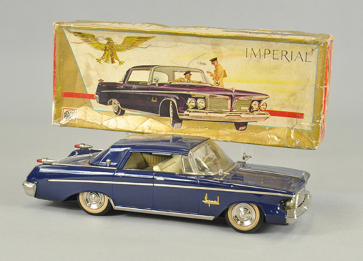 Asahi Toys (Japan) friction-powered 1962 Chrysler Imperial in rich royal blue, 15 inches long, original box, $10,000-$15,000. Image courtesy Bertoia Auctions.