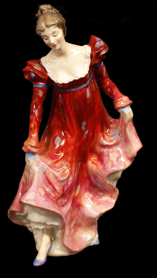 The Royal Doulton figure HN 2066 Minuet in red is considered scarce, having been produced only from 1950 to 1955. With a very small area of glaze loss to the rear foot, this 7 1/2-inch figure has a $400-$600 estimate. Image courtesy Austin Auction Gallery.